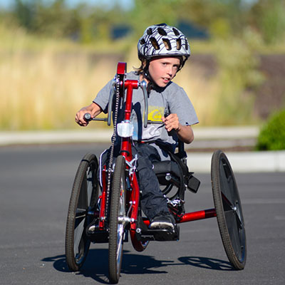 youth on hand cycle