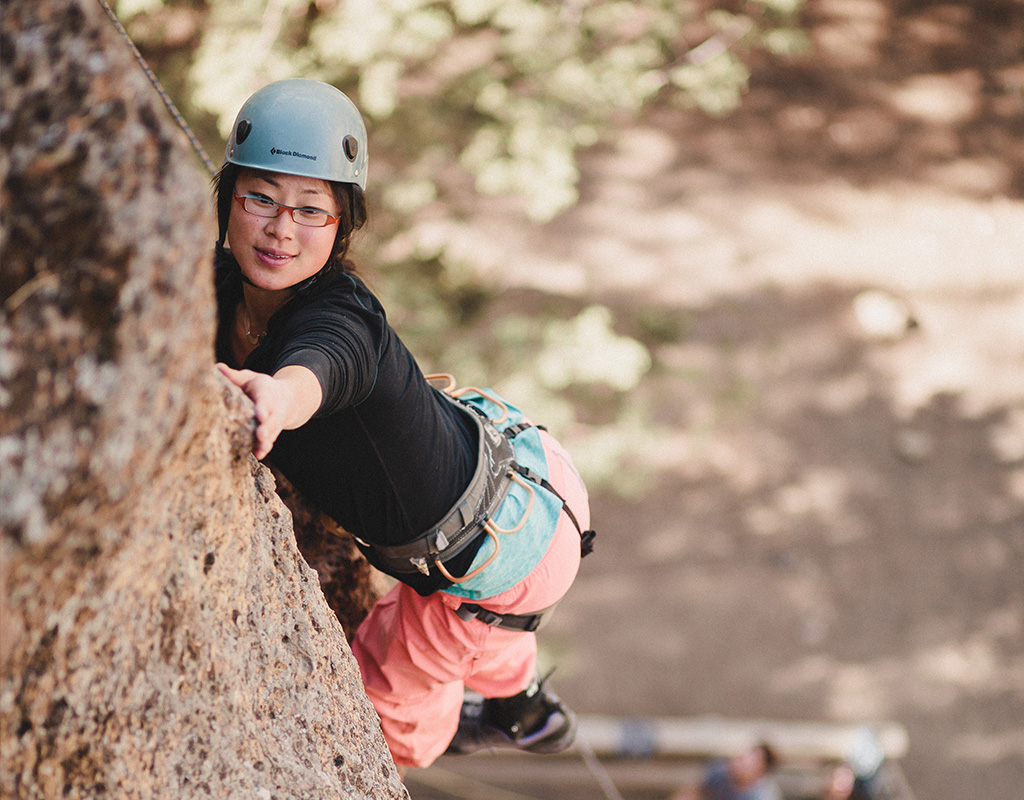 adaptive climber making move on climb at smith rock state park