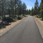 steeper section of rimrock's paved trail through ponderosa forest