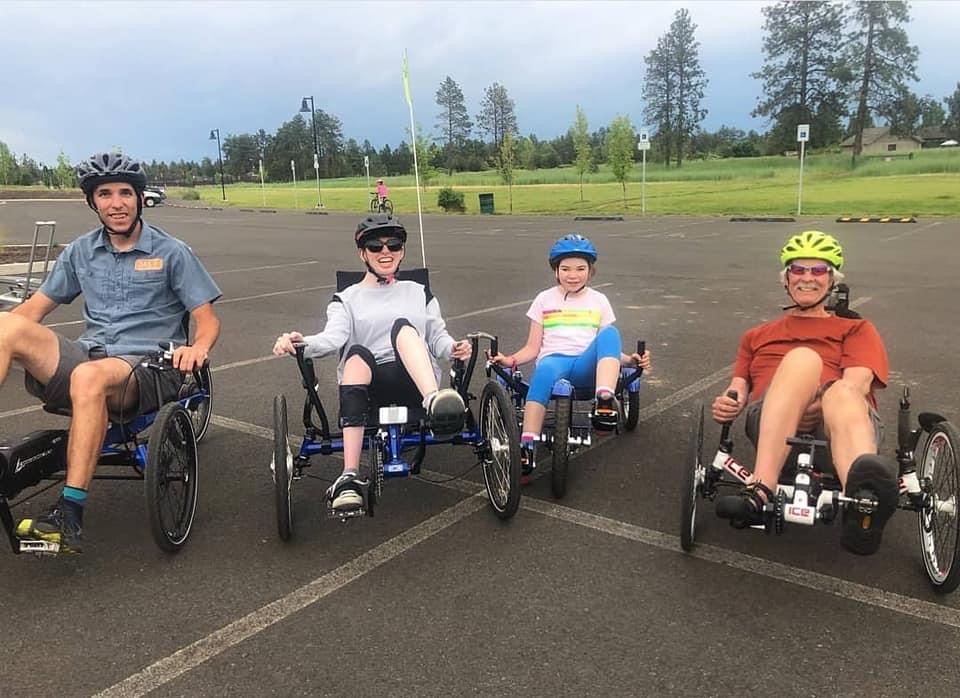 four OAS athletes on bikes at pine nursery park