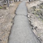 rough paved path along ray atkeson trail