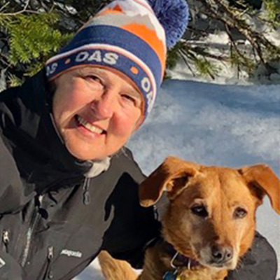 bunny thompson in oas hat with her dog