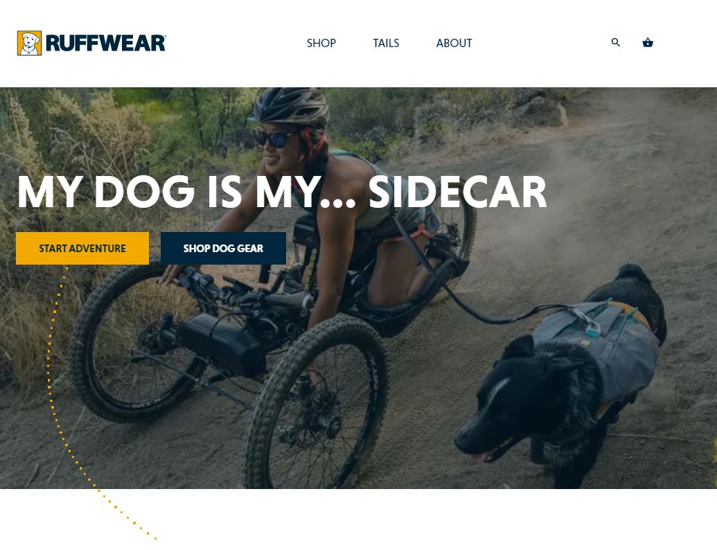 Ruffwear website showing a hand-cyclist and their dog