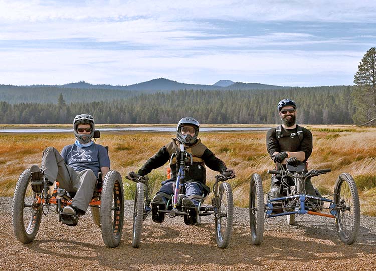 Three adaptive bikers including dave