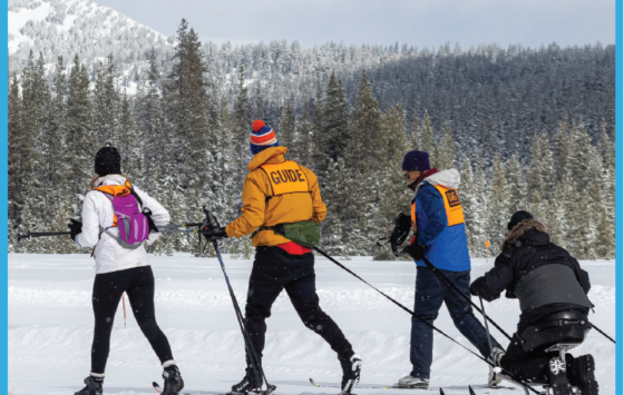 Adaptive Nordic Skiing at Mt. Bachelor, three support staff with one athlete