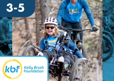 May 3-5, KBF logo, multi-day sport adventure. Adaptive mountain biker blazing down a trail with a volunteer spotting from behind. Applications Closed.