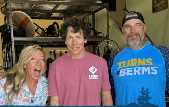 Melodie, Dave, and Jared pose for a photo in the O-A-S warehouse