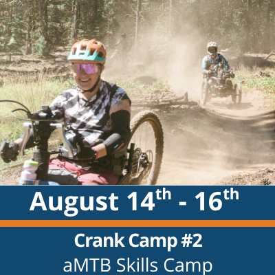 August 14th to 16th. Crank Camp number 2. aMTB Skills Camp. A rider in a helmet and sunglasses pedals a handcycle along a dusty forest trail in the foreground, with another rider on an adaptive bike following behind through the trees.