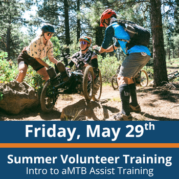 two people stand on either side of an adaptive mountain bike assisting an athlete seated in the bike as they navigate over a rock; all three wear helmets and focus on the bike; text at the bottom reads “Friday, May 29th,” “Summer Volunteer Training,” and “Intro to aMTB Assist Training.”