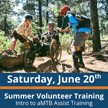 two people stand on either side of an adaptive mountain bike assisting an athlete seated in the bike as they navigate over a rock; all three wear helmets and focus on the bike; text at the bottom reads “Saturday, June 20th,” “Summer Volunteer Training,” and “Intro to aMTB Assist Training.”